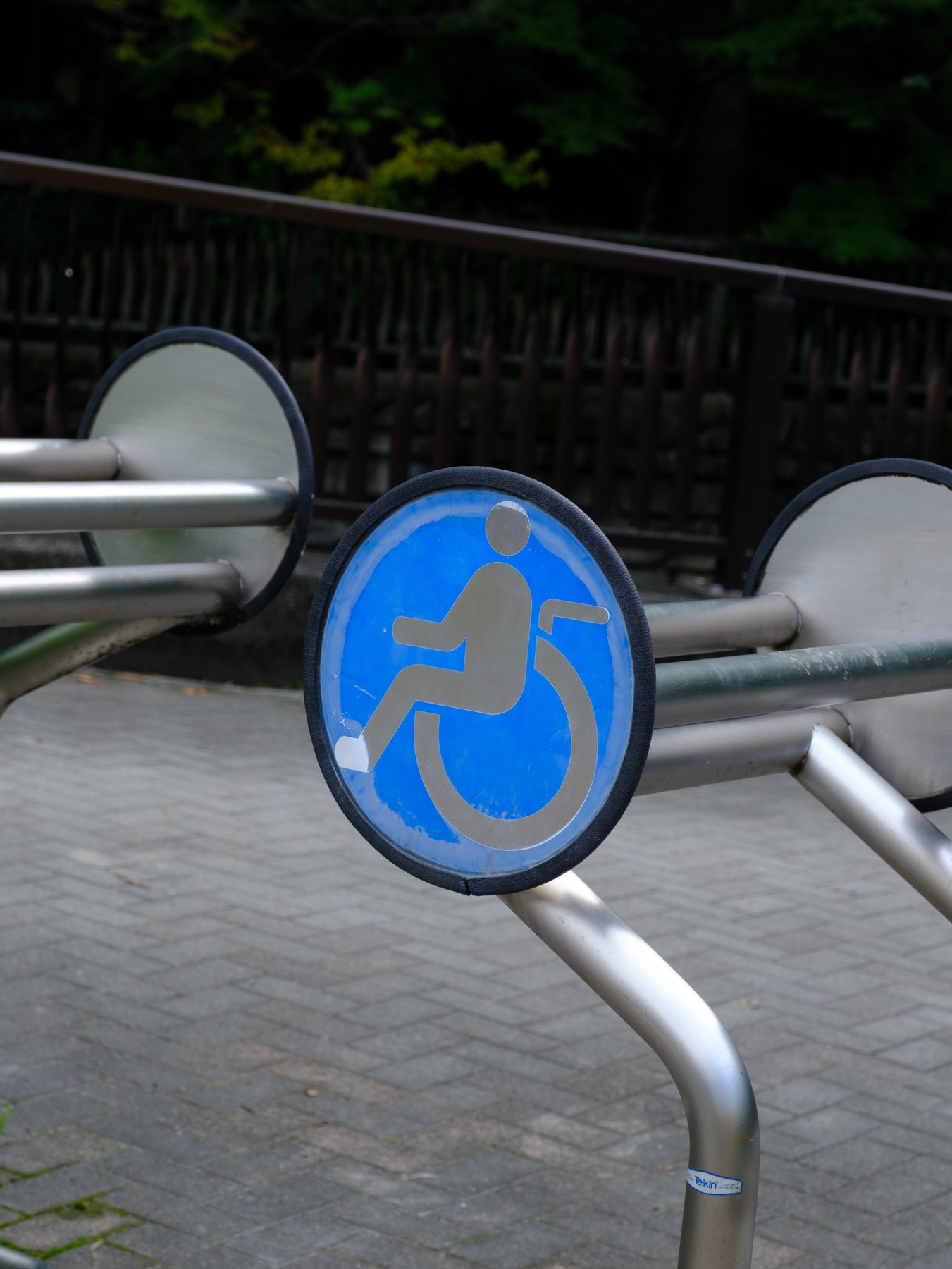 A blue pedestrian sign photographed for comparing Fujifilm profiles and presets