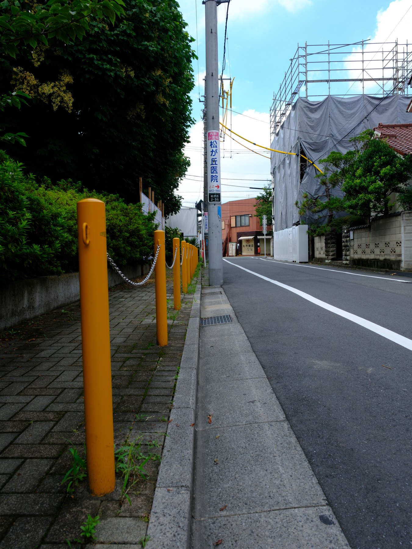 An everyday residential Tokyo street photographed without identifiable faces