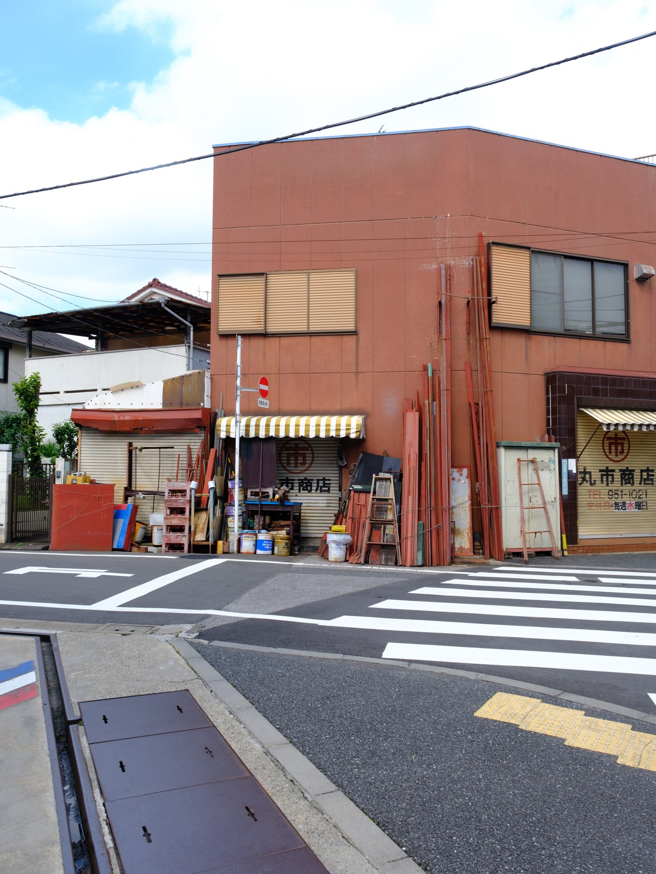 A neighborhood Tokyo storefront photographed as part of a travel series