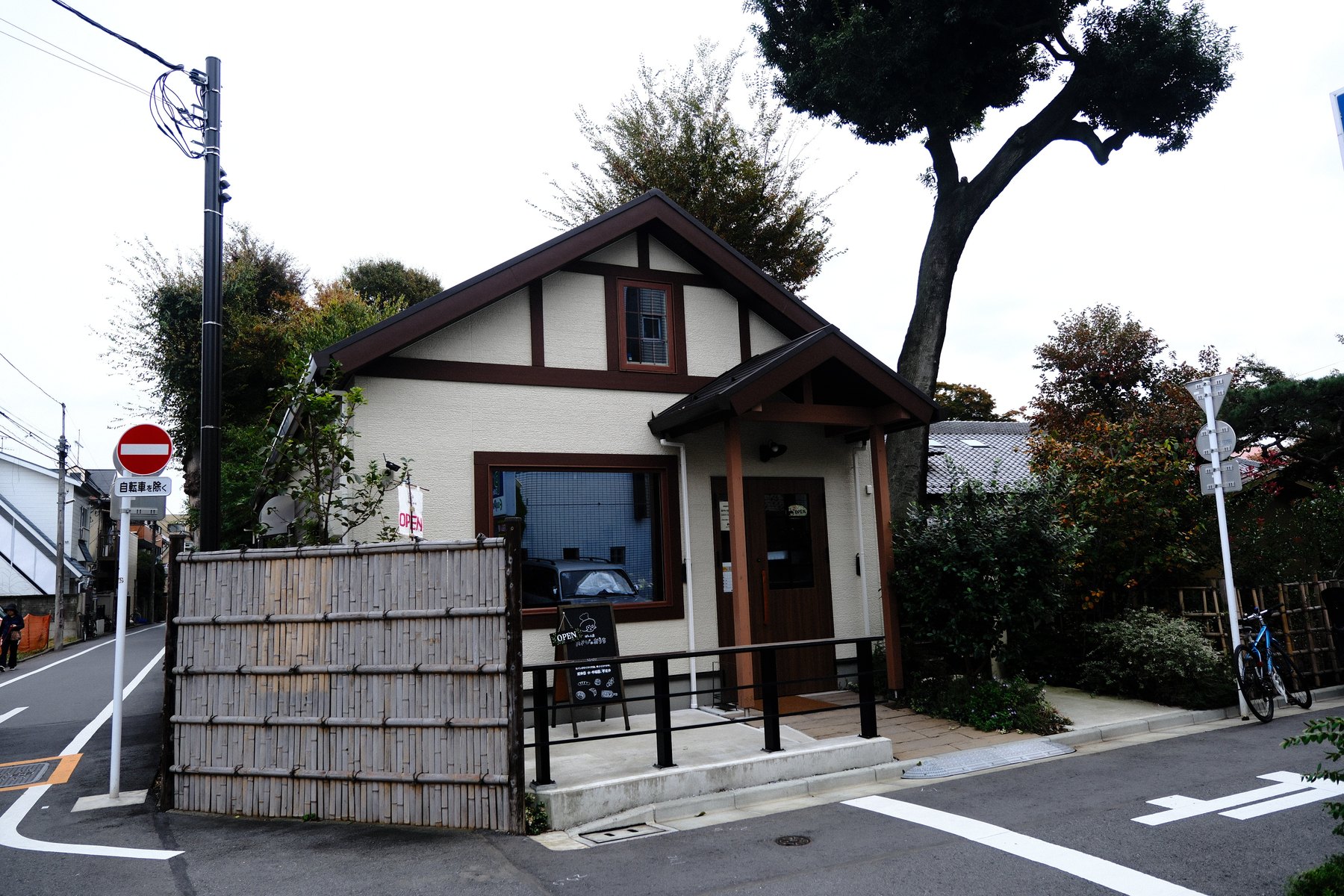 A modest Tokyo building showing restraint, use, and changing material character